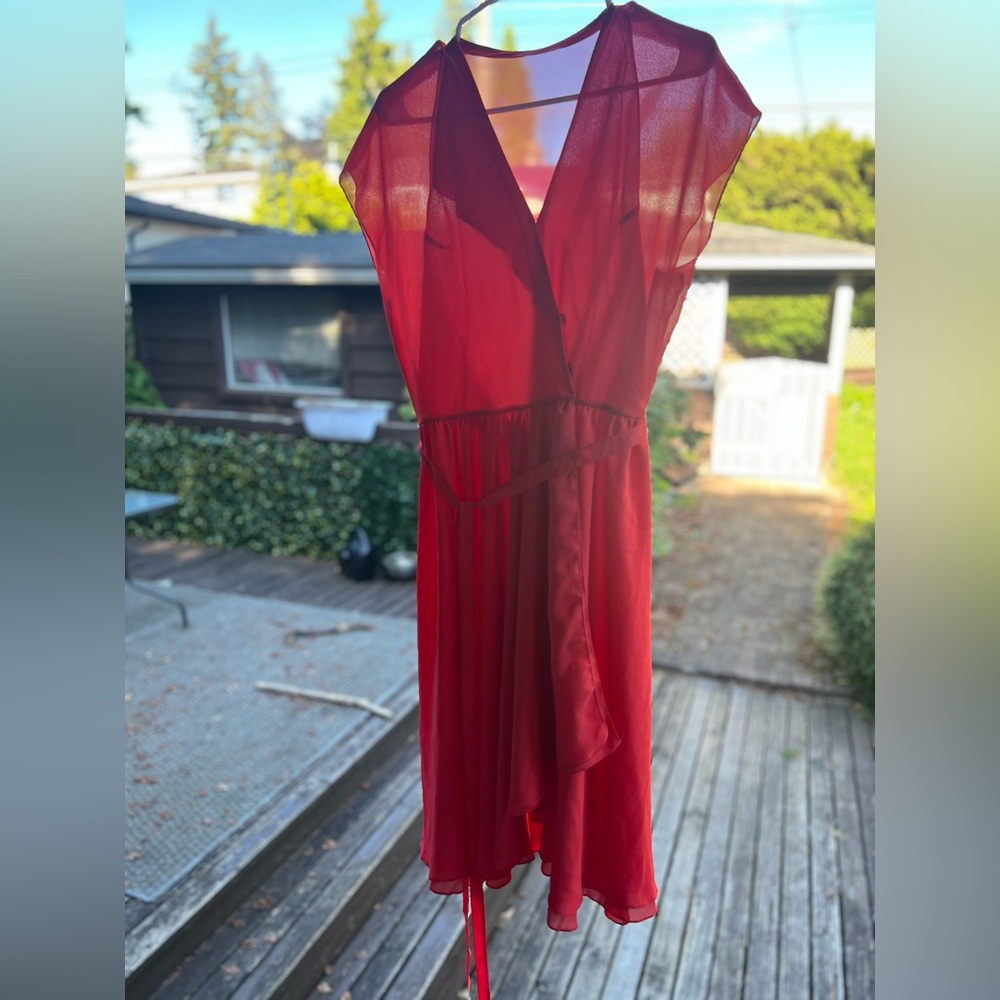 Vintage Adele Simpson orange wrap dress